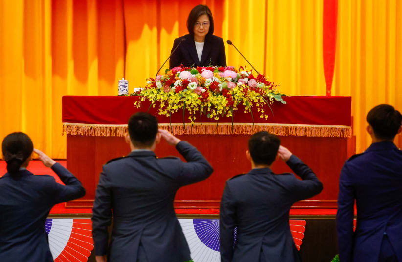 Students salute Taiwan's President Tsai Ing-wen during a graduation ceremony at the National Defense University in Taipei, Taiwan June 21, 2023. (photo credit: ANN WANG/REUTERS)