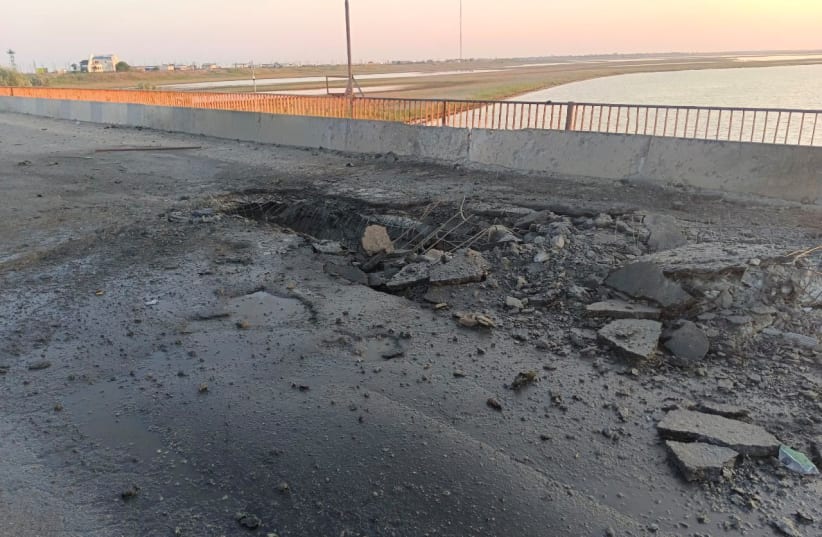  A view shows the damaged Chonhar bridge connecting Russian-held parts of Ukraine's Kherson region to the Crimean peninsula, following what Russian-appointed officials say was a Ukrainian missile attack, in this picture released June 22, 2023 (photo credit: Russian-installed leader of the Kherson region Vladimir Saldo via Telegram/Handout via REUTERS)