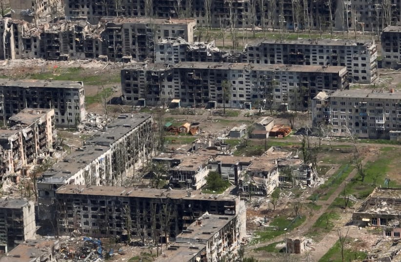  Aerial view shows destroyed buildings as a result of intense fighting, amid the Russian invasion, in Bakhmut, Ukraine in this still image from handout video released June 15, 2023 (photo credit: REUTERS)