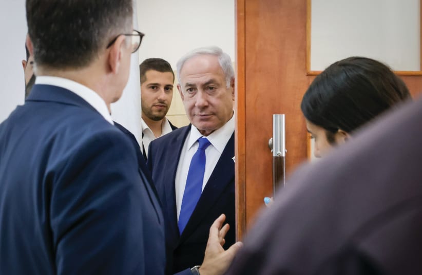  PRIME MINISTER Benjamin Netanyahu arrives at the Jerusalem District Court to hear testimony of businessman Arnon Milchan in the Case 1000 corruption trial, this week.  (photo credit: MARC ISRAEL SELLEM/THE JERUSALEM POST)