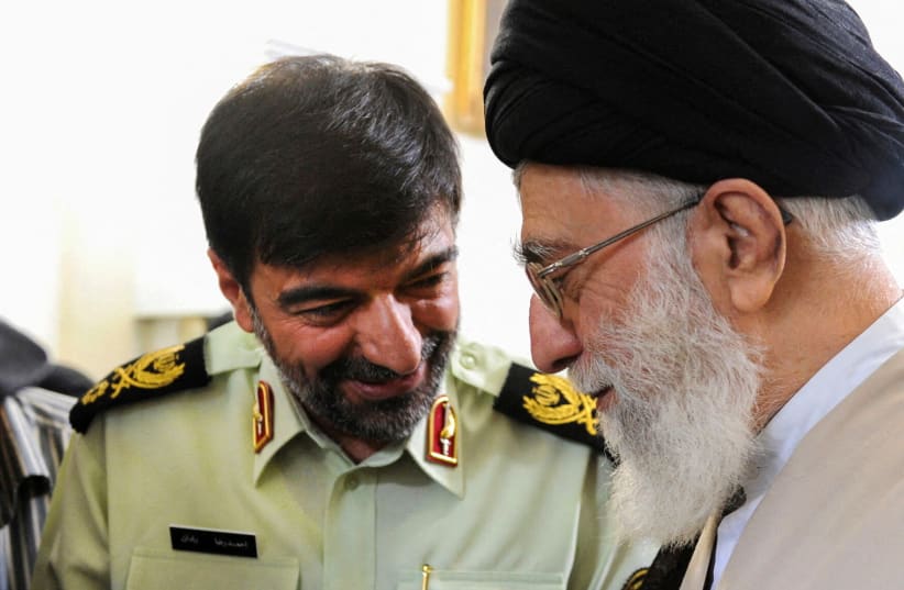 Iran's Supreme Leader Ayatollah Ali Khamenei meets with the new chief commander of the Iranian police force, Ahmad-Reza Radan in Tehran, Iran, in this picture obtained on January 7, 2023. (photo credit: Office of the Iranian Supreme Leader/WANA/Handout via Reuters)