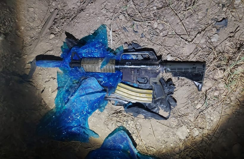  A rifle confiscated by Israel Police is seen (photo credit: ISRAEL POLICE)