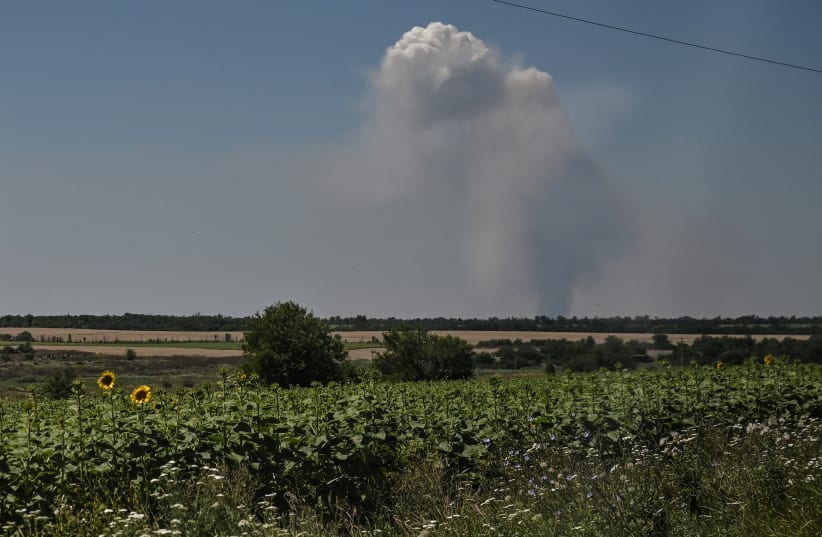  Smoke rises after a military strike in a front line, amid Russia's attack on Ukraine, in Zaporizhzhia region, Ukraine July 13, 2023. (photo credit: REUTERS/STRINGER)