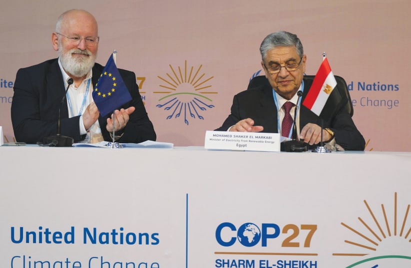  EUROPEAN COMMISSION and Egyptian officials appear at a session of the COP27 climate summit in Sharm el-Sheikh, last year.  (photo credit: Emilie Madi/Reuters)