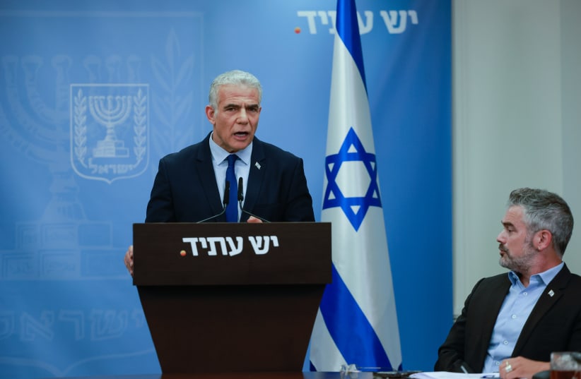  Head of the Yesh Atid party MK Yair Lapid speaks during a faction meeting at the Knesset, the Israeli parliament in Jerusalem, on July 17, 2023 (photo credit: Chaim Goldberg/Flash90)
