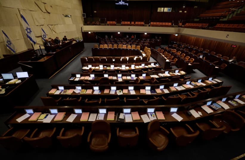 The Knesset Plenum is seen empty ahead of Monday's vote on the reasonableness standard bill, the first piece of judicial reform legislation to reach the floor for a final vote, July 23, 2023  (photo credit: MARC ISRAEL SELLEM/THE JERUSALEM POST)