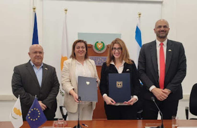  From right to left: The Israeli ambassador Oren Anolik, Nurit Tinari (MFA), Minister of Education, Sport and Youth Dr Athena Michaelidou, Dr. Ioannis Savvides (Ministry of Education)  (photo credit: Embassy of Israel in Cyprus)