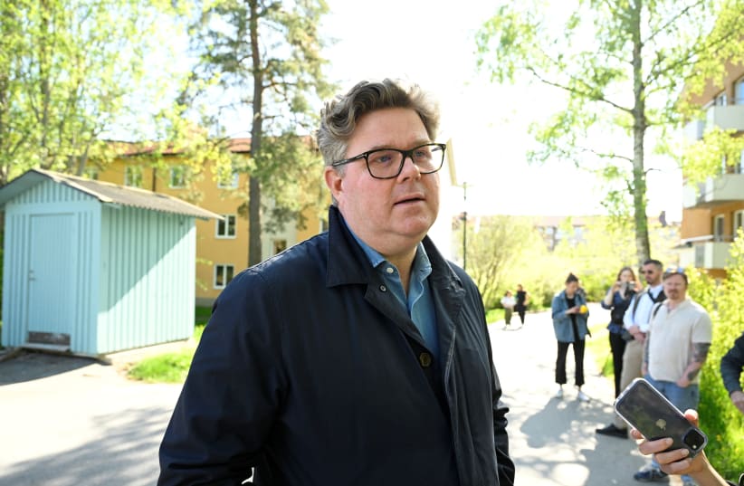  Swedish Justice Minister Gunnar Strommer visits the Stockholm suburb Ragsved following an incident, in Stockholm, Sweden, May 19, 2023. (photo credit: Jessica Gow/TT News Agency/via REUTERS)