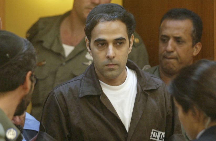 Yigal Amir, Prime Minister Yitzhak Rabin's assassin, appears before the Israeli Supreme Court in Jerusalem, Sept. 8, 2004. (photo credit: URIEL SINAI/GETTY IMAGES)