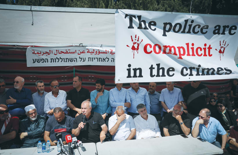  ARAB ISRAELI leaders hold a news conference, earlier this year, at a tent set up near the Prime Minister’s Office in Jerusalem, protesting what they say is a lack of governmental and police effort to thwart violence in their sector. (photo credit: YONATAN SINDEL/FLASH90)