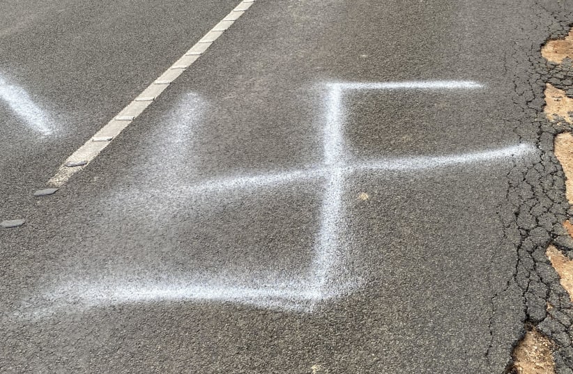 A swastika was painted onto a busy road in Australia. (photo credit: ANTI-DEFAMATION COMMISSION)