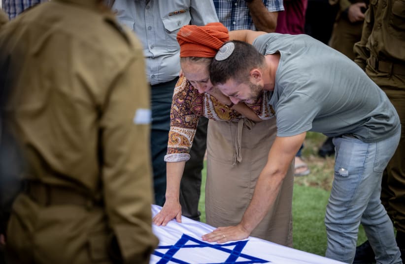  Friends and family attend the funeral of Israeli soldier Hillel Ofen at Mt Herzl military cemetery in Jerusalem. Ofen died after collapsing in training. August 15, 2023.  (photo credit: CHAIM GOLDBEG/FLASH90)