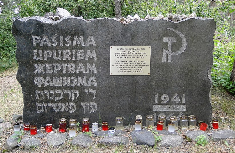 A memorial marker for Jews killed in the Holocaust can be seen in Rumbula forest, Riga, Latvia. (photo credit: Wikimedia Commons)
