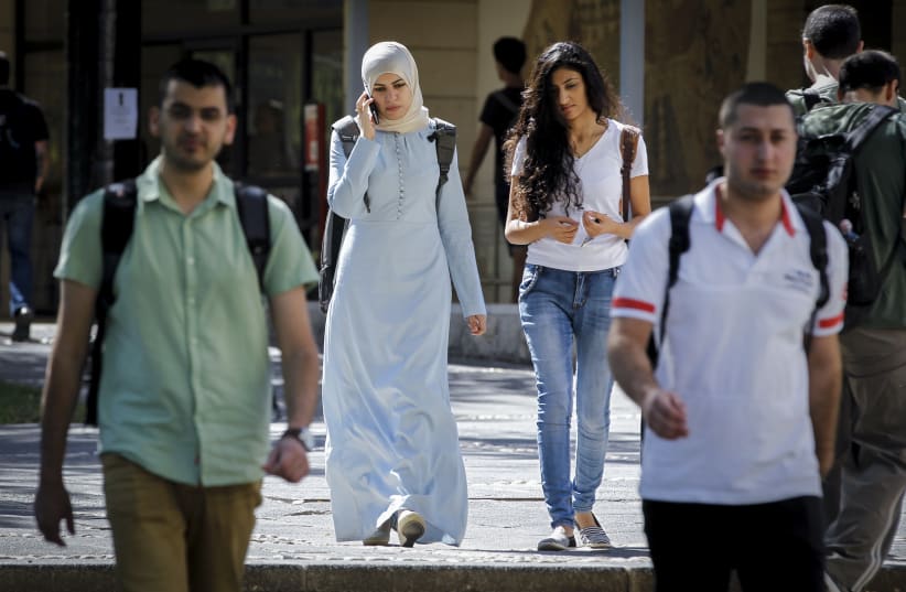 Arab students seen at the campus of "Givat Ram" at Jerusalem's Hebrew University on the first day of the new academic year, October 26, 2014. (photo credit: MIRIAM ALSTER/FLASH90)