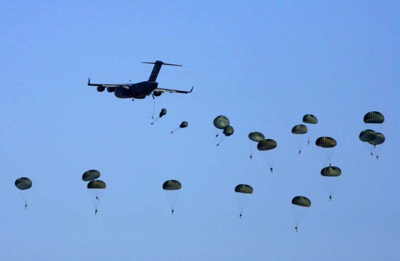  American and Egyptian paratroopers are air-dropped from a C-130 Hercules aircraft during exercise Bright Star 2007 (photo credit: REUTERS/NASSER NURI)