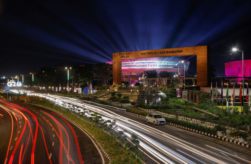  Traffic moves past the 'Bharat Mandapam', the main venue of the G20 Summit in New Delhi, India, September 5, 2023. (photo credit: REUTERS/ADNAN ABIDI)