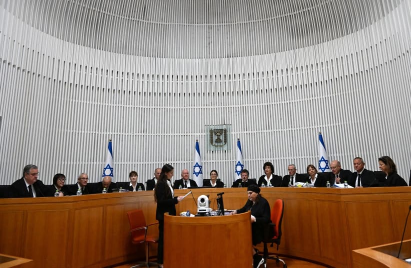  President of the Supreme Court of Israel Esther Hayut and all fifteen justices assemble to hear petitions against the reasonableness standard law in the High Court in Jerusalem, on Tuesday, September 12, 2023.  (photo credit: DEBBIE HILL/Pool via REUTERS)