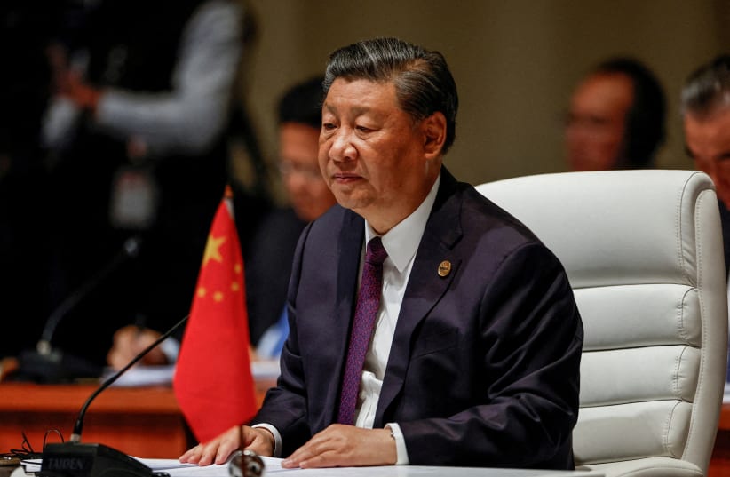  Chinese President Xi Jinping attends the plenary session of the 2023 BRICS Summit at the Sandton Convention Centre in Johannesburg, South Africa on August 23, 2023. (photo credit: GIANLUIGI GUERCIA/Pool via REUTERS/File Photo)