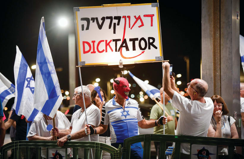  ANTI-JUDICIAL overhaul demonstrators protest at Ben-Gurion Airport as Prime Minister Benjamin Netanyahu flies to the US, earlier this week. Netanyahu disparaged demonstrators as ‘joining forces with the PLO, Iran, and others.’ (photo credit: AVSHALOM SASSONI/FLASH90)