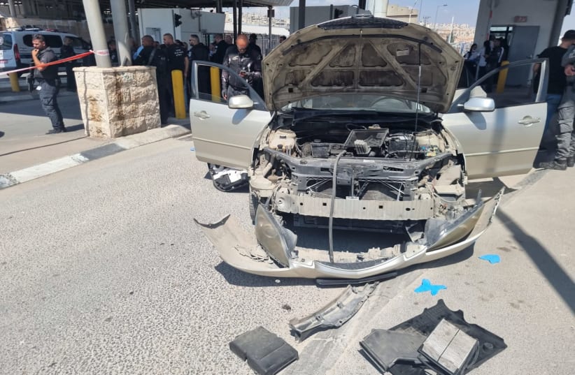 The suspect's car is shown in the aftermath of the ramming attack at Qalandia checkpoint in the West Bank on Thursday, September 21, 2023. (photo credit: ISRAEL POLICE SPOKESPERSON'S UNIT)