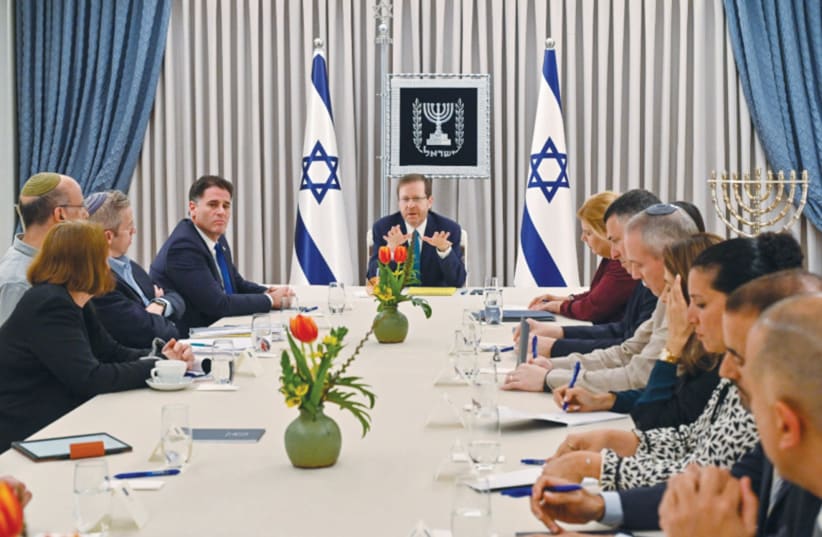  PRESIDENT ISAAC Herzog meets with members of the government coalition and political opposition to discuss judicial reform, at the President’s Residence in Jerusalem, in March. Pray that all parties seek compromise, the writer urges.  (photo credit: KOBI GIDEON/GPO)
