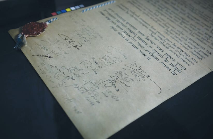  THE ORIGINAL scroll of the Declaration of Independence: The words are not a hastily drafted text; they are constitutive words, the writer argues. (photo credit: MIRIAM ALSTER/FLASH90)