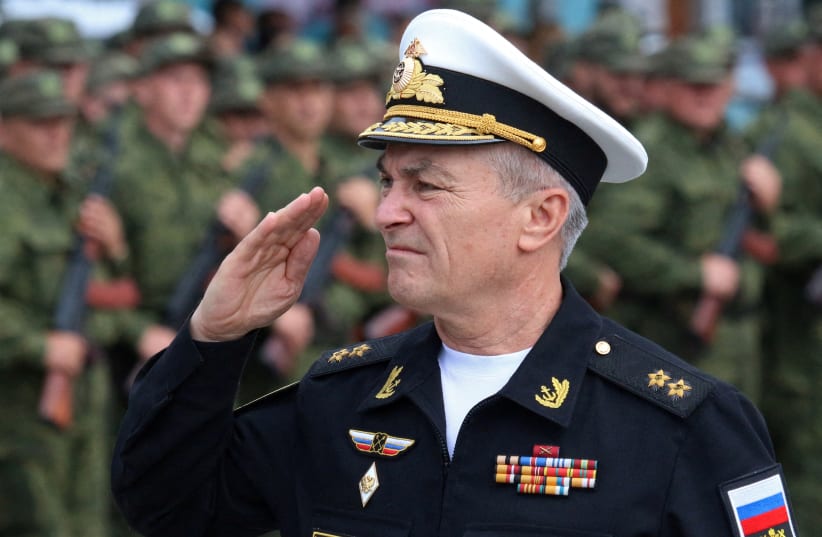  Commander of the Russian Black Sea Fleet Vice-Admiral Viktor Sokolov salutes during a send-off ceremony for reservists drafted during partial mobilisation, in Sevastopol, Crimea September 27, 2022. (photo credit: REUTERS/ALEXEY PAVLISHAK)