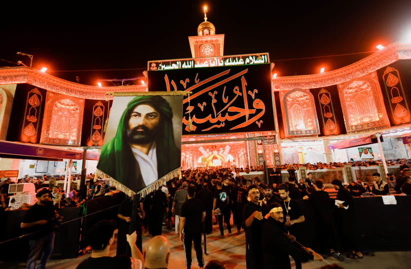  Shi'ite Muslim pilgrims take part in a mourning ceremony, during the holy Shi'ite ritual of Arbaeen, in the holy city of Karbala, Iraq September 5, 2023 (photo credit: REUTERS/ALAA AL-MARJANI)