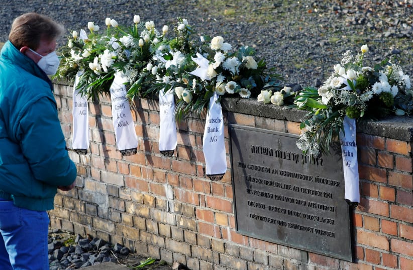  Wreaths are pictured at the Gleis 17 (Platform 17) memorial, a platform at Berlin-Grunewald train station from where Jewish citizens were deported by train to the Nazi concentration camps between 1941 and 1945, in Berlin, Germany, January 27, 2021 (photo credit: REUTERS/FABRIZIO BENSCH)