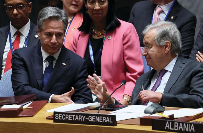  US SECRETARY of State Antony Blinken shakes hands with UN Secretary-General Antonio Guterres during a ministerial level meeting of the Security Council on the crisis in Ukraine, at UN headquarters in New York, last week (photo credit: BRENDAN MCDERMID/REUTERS)