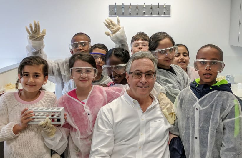  WITH ELEMENTARY school students while visiting the Joseph Meyerhoff Youth Centre at the Hebrew University’s Safra campus. (photo credit: Gary Segal)