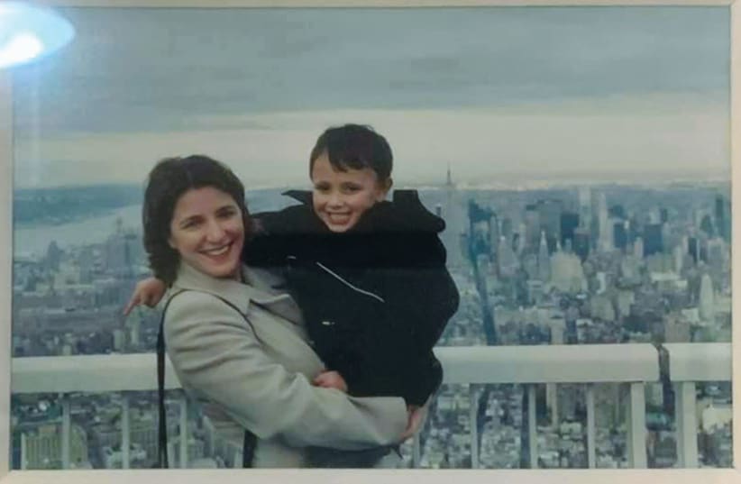  THE WRITER poses with Dan, her eldest son, on the viewing deck of the Twin Towers a few months before 9/11.  (photo credit: JEFF SAMUELS)
