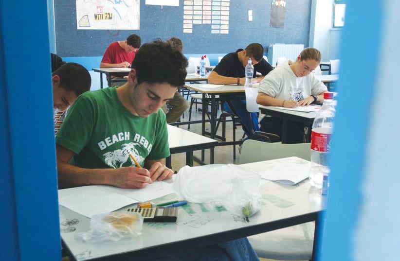  HEBREW MIDDLE school students take their matriculation exams in this illustrative picture. (photo credit: FLASH90)