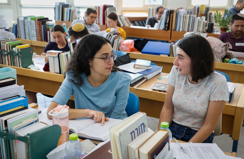  WOMEN AND men study at the women's 'beit midrash' in Migdal Oz. (photo credit: GERSHON ELINSON/FLASH90)