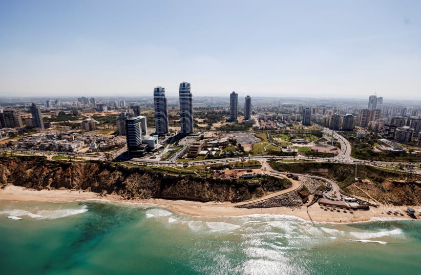  An aerial view taken from a helicopter shows the Israeli city of Netanya, on the Mediterranean coast, April 26, 2023. (photo credit: REUTERS/AMIR COHEN)