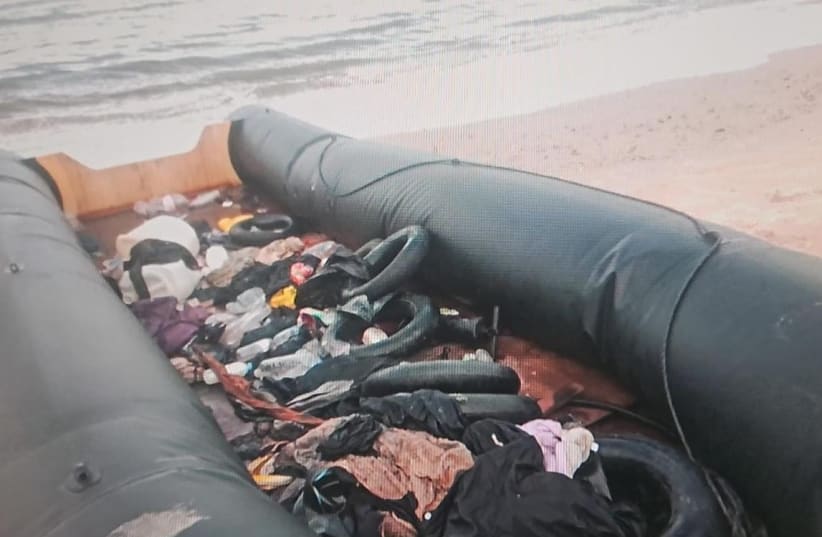  An empty migrant boat washed up on Israel's Mediterranean shore on October 1, 2023 (photo credit: ISRAEL POLICE)