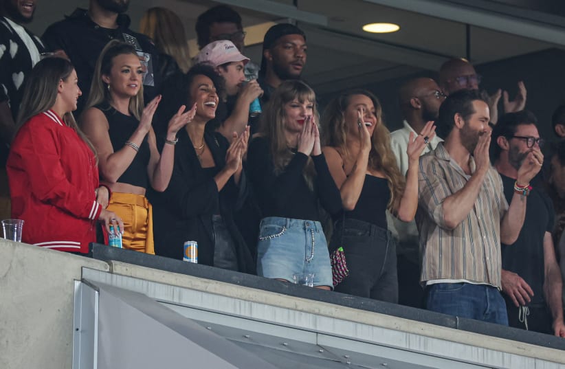  Oct 1, 2023; East Rutherford, New Jersey, USA; Taylor Swift, a guest of Kansas City Chiefs tight end Travis Kelce (not pictured), cheers during the game at MetLife Stadium. (photo credit: VINCENT CARCHIETTA/USA TODAY SPORTS)