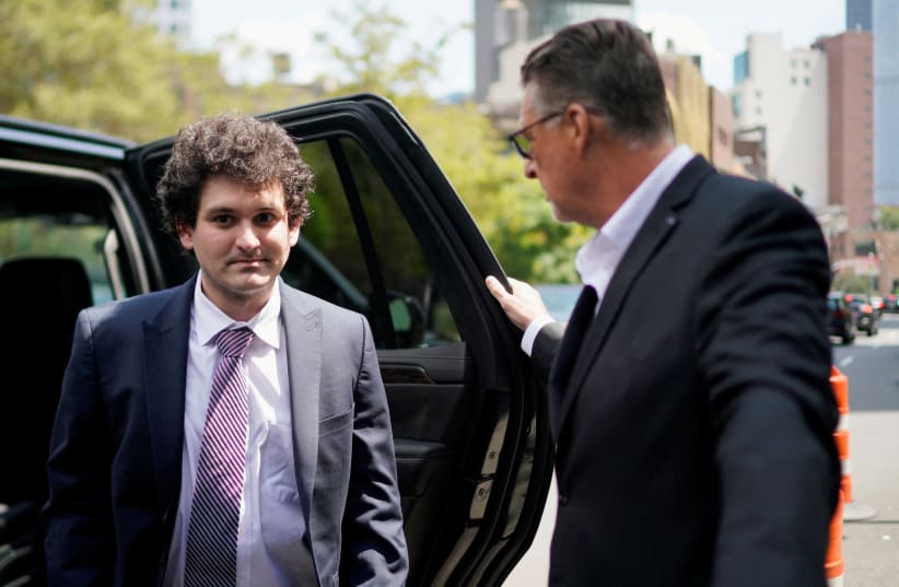  am Bankman-Fried, the founder of bankrupt cryptocurrency exchange FTX, arrives at court as lawyers push to persuade the judge overseeing his fraud case not to jail him ahead of trial, at a courthouse in New York, U.S., August 11, 2023. (photo credit: REUTERS/EDUARDO MUNOZ/FILE PHOTO)