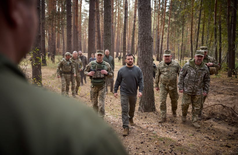  Ukraine's President Volodymyr Zelensky visits a position of Ukrainian troops in a front line, amid Russia's attack on Ukraine, in an undisclosed location, Ukraine October 3, 2023 (photo credit: Ukrainian Presidential Press Service/Handout via REUTERS)