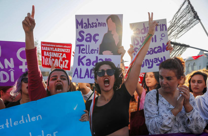  Women take part in a rally on the first anniversary of the death of Mahsa Amini which prompted protests across the country, in Istanbul, Turkey September 16, 2023. (photo credit: REUTERS/DILARA SENKAYA)