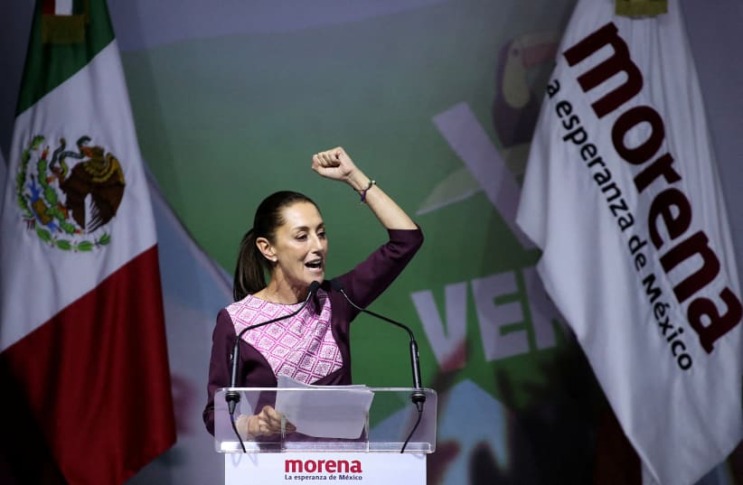 Former Mexico City Mayor Claudia Sheinbaum gestures as she speaks on the day she is certified as presidential candidate for the ruling National Regeneration Movement (MORENA) party during a ceremony, in Mexico City, Mexico September 10, 2023. (photo credit: REUTERS/HENRY ROMERO)
