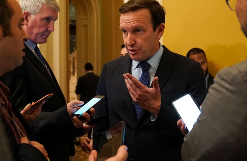  U.S. Senator Chris Murphy (D-CT) speaks to reporters before attending the weekly Democratic caucus luncheon at the U.S. Capitol in Washington, D.C., U.S., November 29, 2022. (photo credit: REUTERS/SARAH SILBIGER)