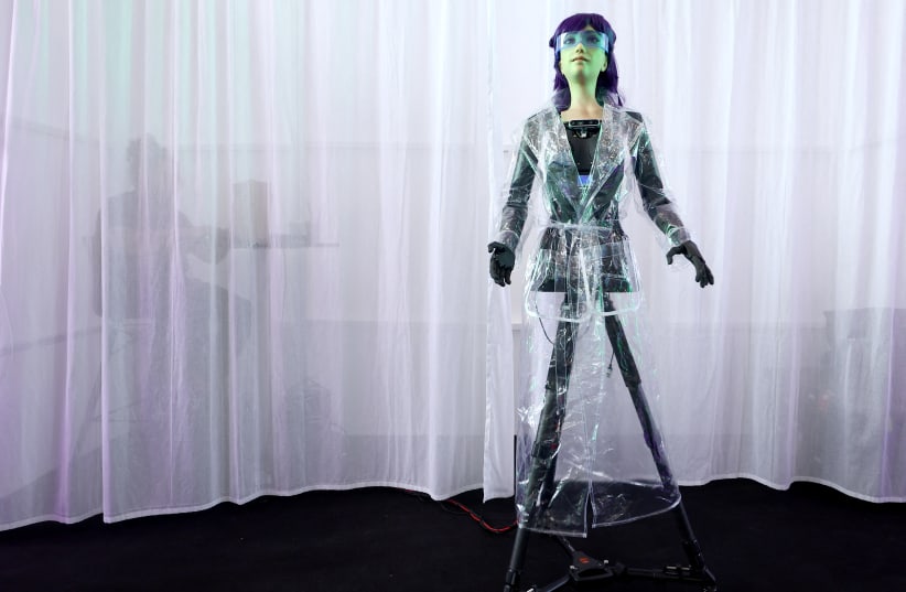  Yada Labs Artificial Intelligence called Desdemona, with a robotic body, stands on a stage and answers questions of visitors during the opening day of the international consumer technology fair IFA in Berlin, Germany September 1, 2023. (photo credit: REUTERS)