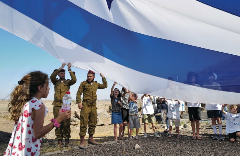  FOREVER SACRED: Yom Kippur War veterans, IDF soldiers, families, and friends gather at the memorial to those who fell in the 1973 Tel Saki battle, Sept. 27 (photo credit: MICHAEL GILADI/FLASH90)