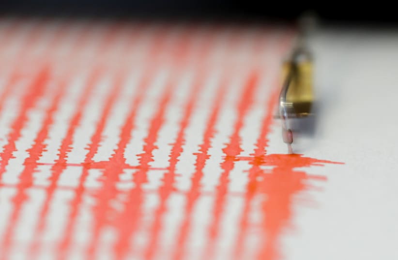  A waveform seismograph registers a minor seismic movement at the Institute for Seismologic Research in Magurele, Ilfov, Romania, February 15, 2023. (photo credit: Inquam Photos/Octav Ganea via REUTERS)