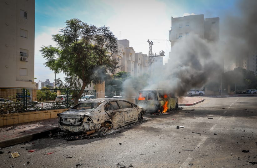  The scene where a rocket fired from Gaza into Southern Israel, hit and caused damaged in the southern Israeli city of Ashkelon. October 7, 2023.  (photo credit: JAMAL AWAD/FLASH90)