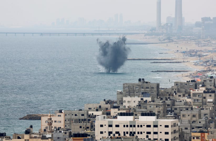  Sea water splash following Israeli strikes in Gaza, October 9, 2023 (photo credit: REUTERS/MOHAMMED SALEM)