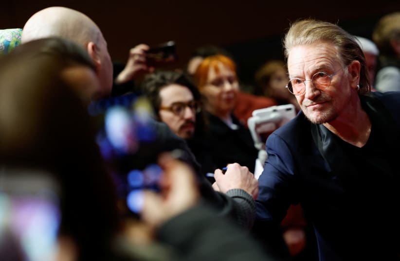 Bono, lead singer of Irish band U2 arrives to attend the screening of the documentary movie 'Kiss the Future' at the 73rd Berlinale International Film Festival in Berlin, Germany, February 19, 2023 (photo credit: REUTERS/MICHELE TANTUSSI)