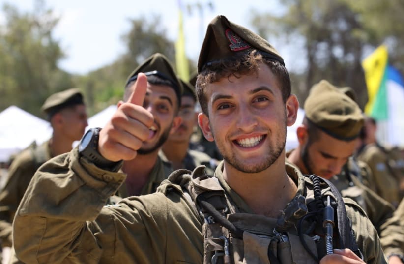  Roey Weiser, 21, who was killed in action this week during Hamas' attack on Israel's south. (photo credit: COURTESY OF THE FAMILY)
