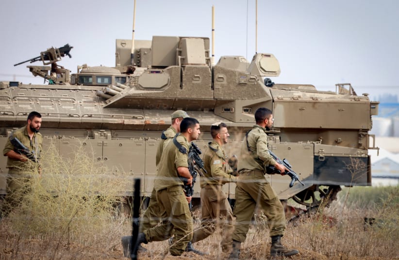 Israeli soldiers at a staging area near the Israeli-Gaza Border, southern Israel, October 10, 2023 (photo credit: YOSSI ZAMIR/FLASH90)